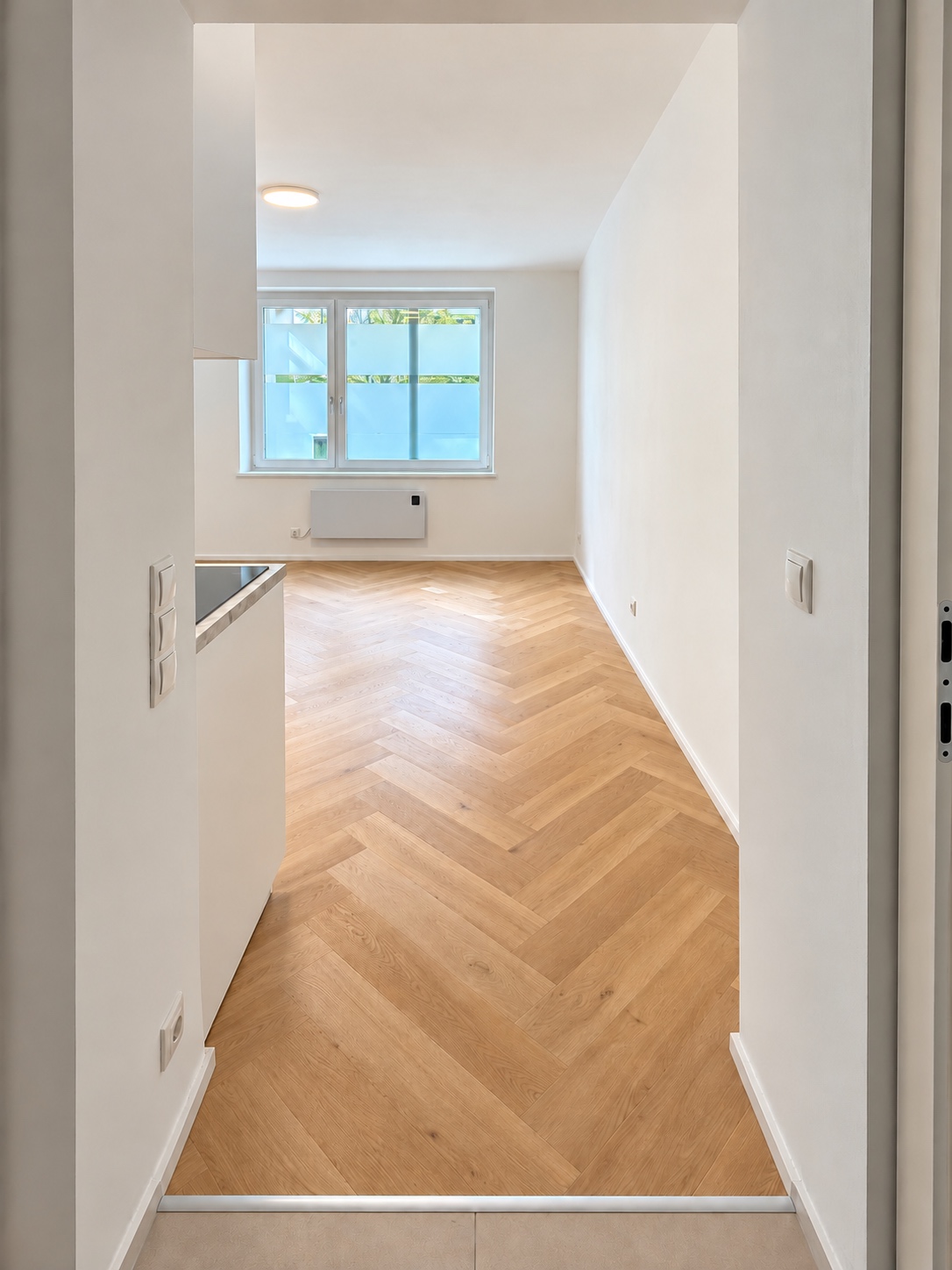 Fertiger Wohnraum mit Fischgrätboden in 1130 Wien